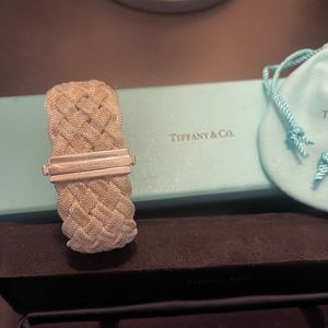 Beautiful Tiffany bracelets in original box. Only worn twice.